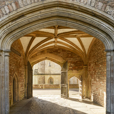 "St Andrew's Street" large greeting card featuring a pedestrian gate and a wagon gate in Vicars' Close, Wells.